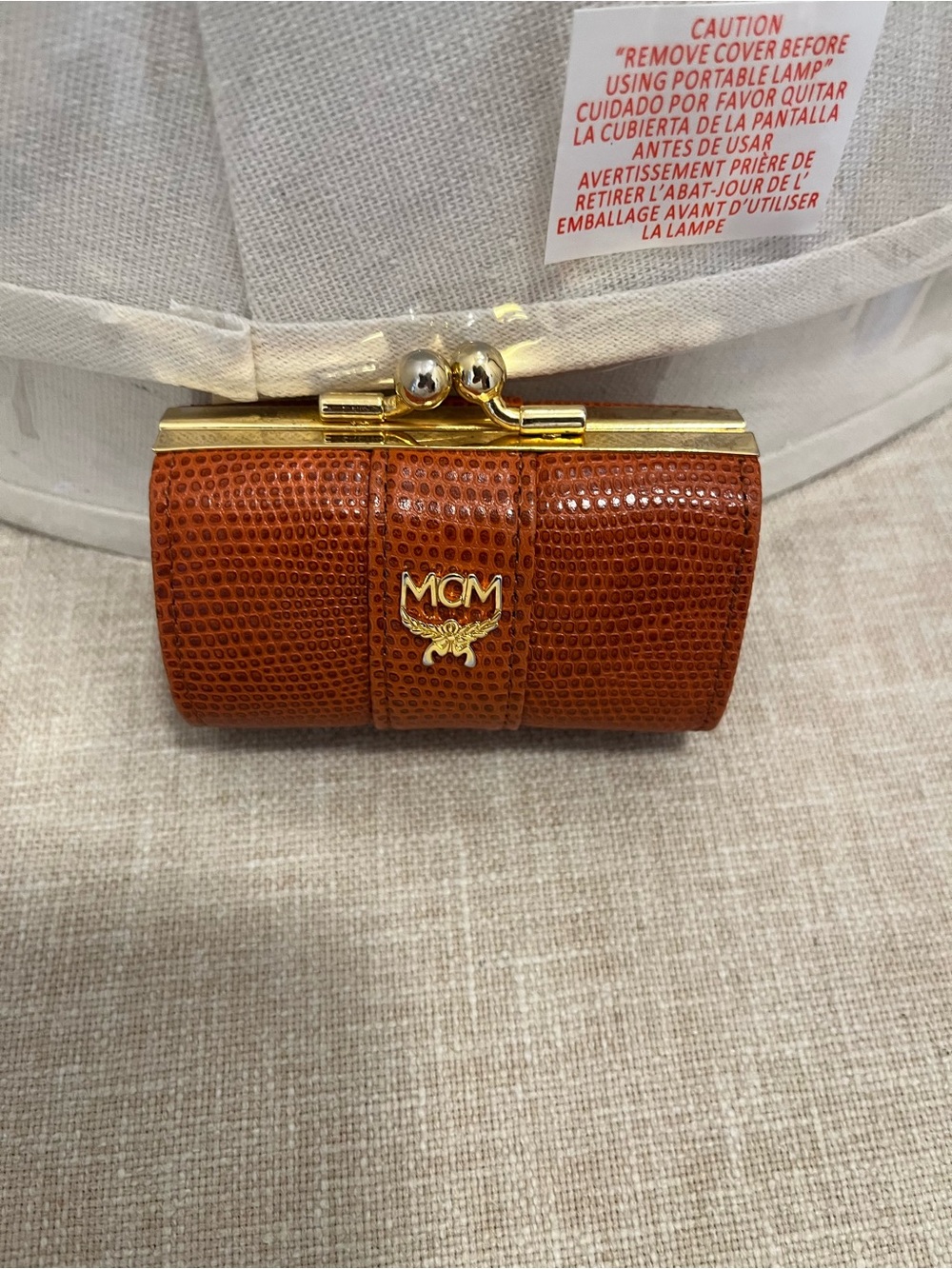 MCM Small Lizard-Texture Leather coin purse in Cognac